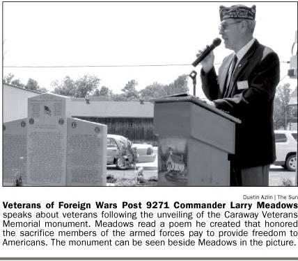 Newspaper snippet: Veterans of Foreign Wars Post 9271 Commander Larry Meadows speaks at Veterans Monument unveiling